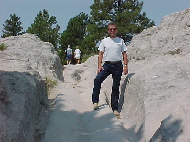 Image of Lee standing in ruts
