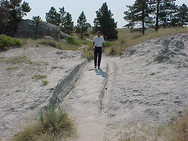Image of Lee standing in ruts