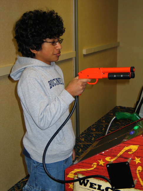 Image of Scott at arcade game