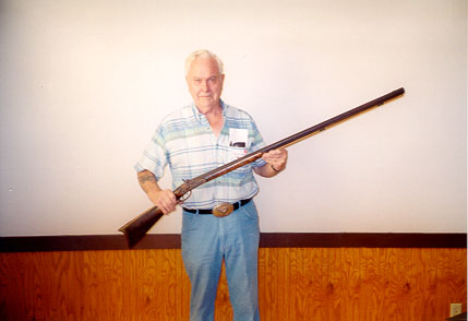 Image of Bob Jackson holding Ulysses
Jackson's gun