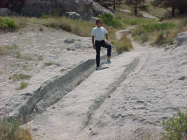 Image of Lee standing in ruts
