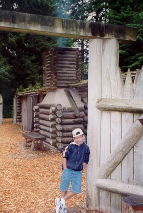 Image of Scott at Gate of Fort Clatsop