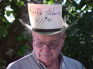 Image of Bob Jackson
selling raffle tickets, Sunday, August 6, 2000